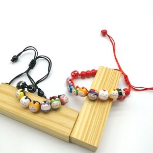Black or Red Smiling EMOJI Cat Bracelets